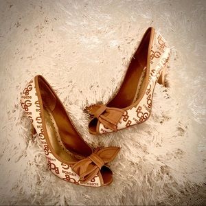 BCBG girls peep toe camel and cream pumps